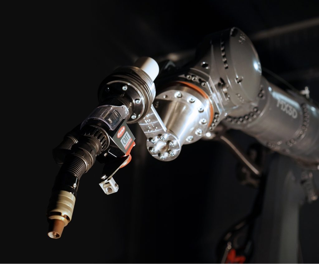 Arc robots of MX3D inside the Metal AM System. Close-up shot.