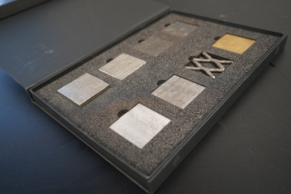 A sample box containing the different metal materials/alloys MX3D prints with.